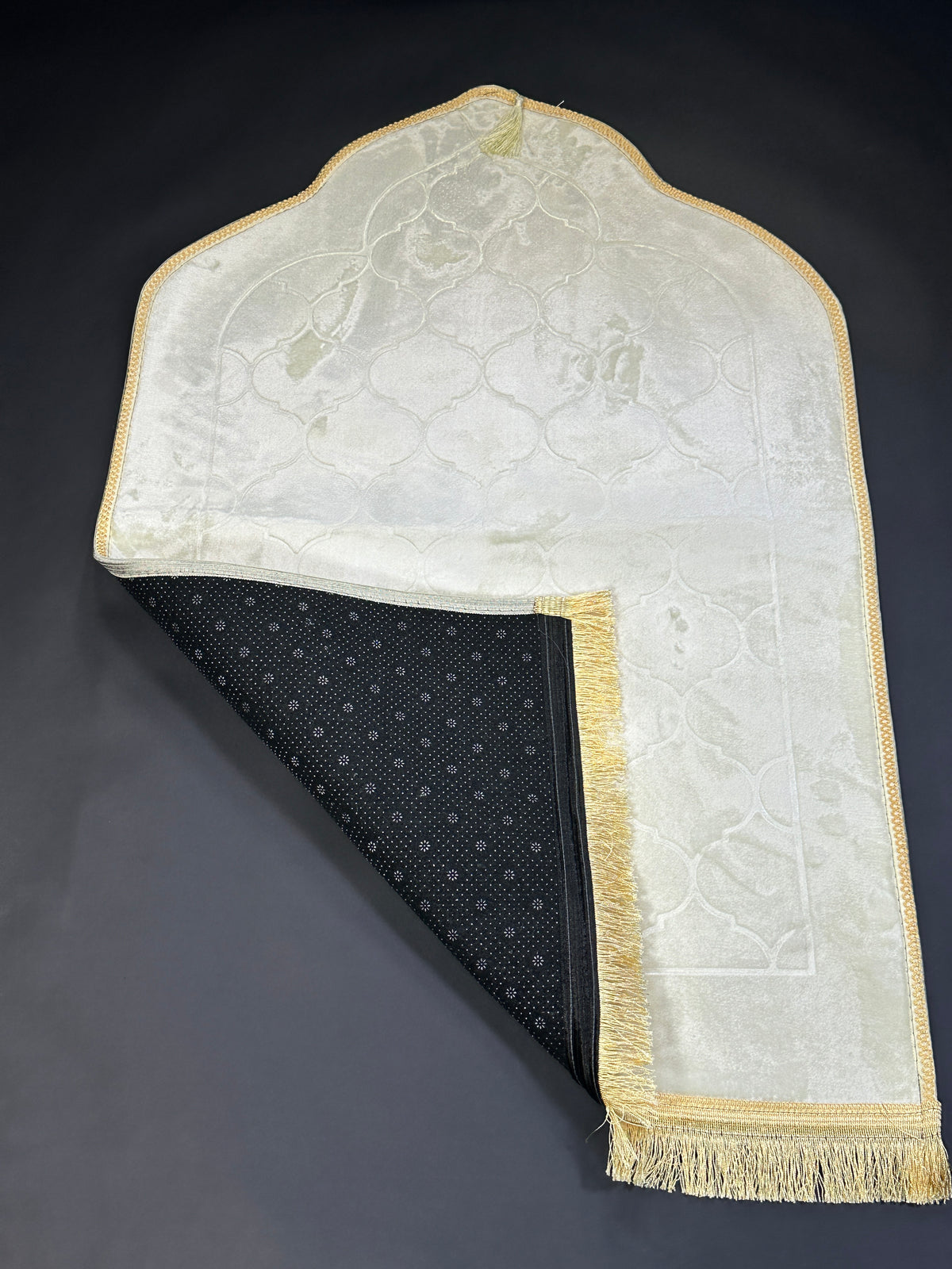 Cream velvet prayer mat folded