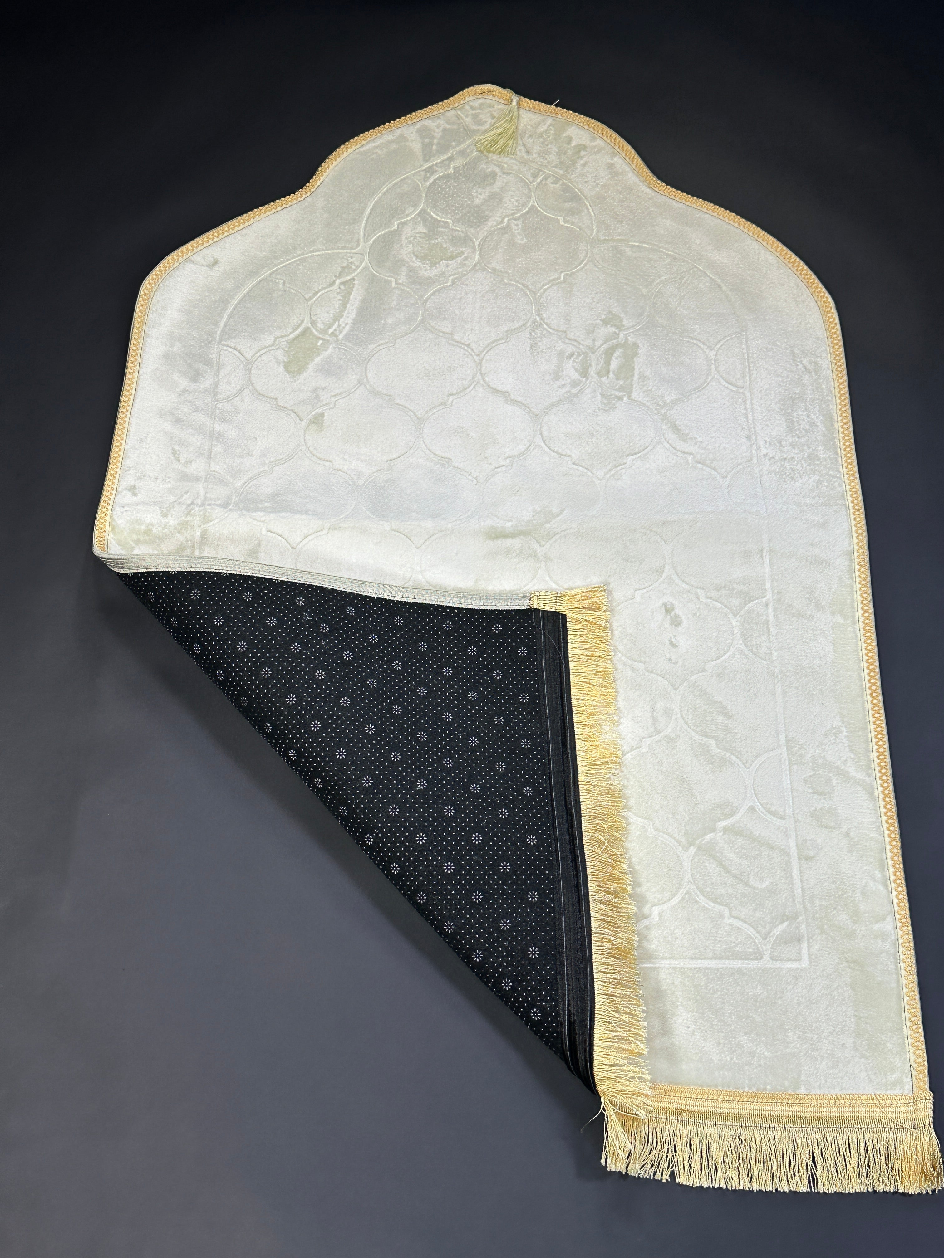 Cream velvet prayer mat folded